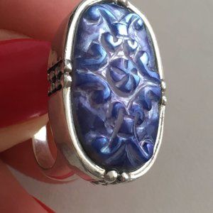 Artisan crafted , carved abalone set in 925 sterling size 7.5